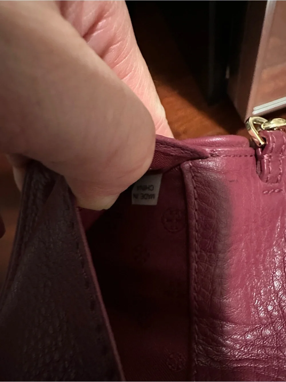 Tory Burch Pebbled Leather Wristlet in Deep Burgundy with Gold Logo